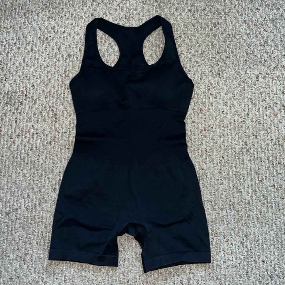 Brand new shapewear bodysuit in black with open back in Size M